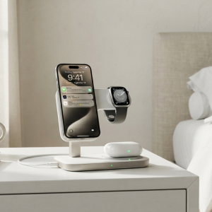3-in-1 wireless charging station charging iPhone, Apple Watch, and AirPods on a modern bedside table.